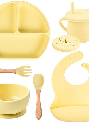 Набір силіконового посуду y11 трьохсекційна тарілка, поїльник, ложка виделка дерев'яні, слюнявчик жовтий