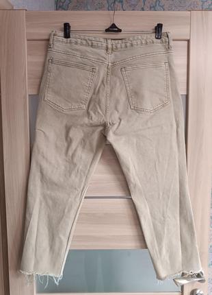 Стильні високі джинси8 фото