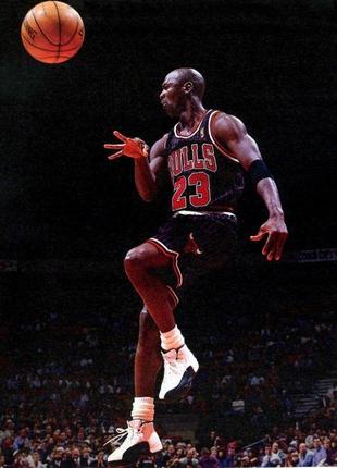 Баскетбольна джерсі nba chicago bulls №23 michael jordan чорна від виробника - champion usa1 фото