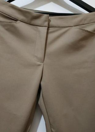 Женские стильные универсальные брюки от maddison 40 р/l1 фото