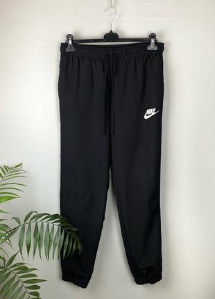 Оригінальні спортивні штани nike nsw trk suit розмір l2 фото