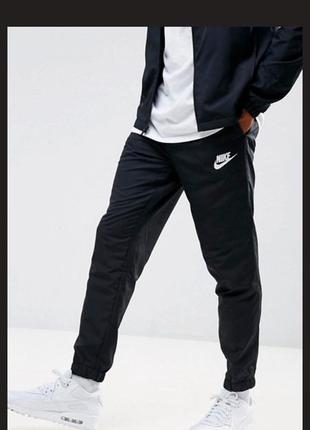 Оригінальні спортивні штани nike nsw trk suit розмір l1 фото