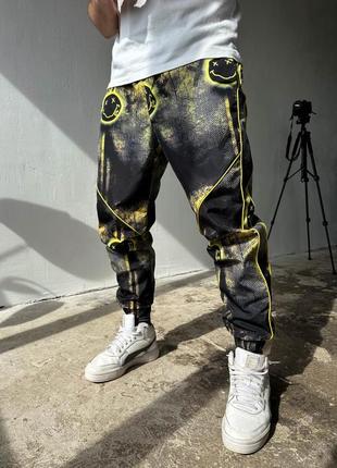 Спортивные штаны с принтами3 фото