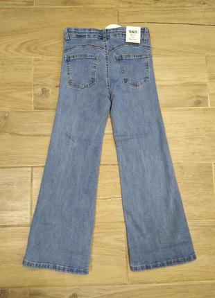 Стильные подростковые джинсы клёш для девочки 134-170р.2 фото