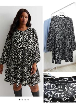 Ярусное отрезное платье с объемными рукавами с оборкой рекава на резинке объемные...