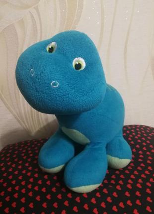 Іграшка дісней — динозавр в ідеальному стані