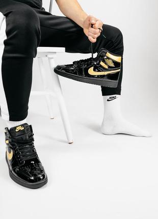 Кросівки jordan 1 retro black\gold кросівки2 фото