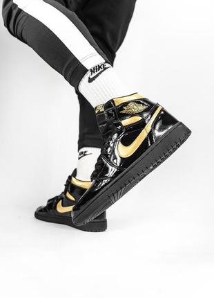 Кросівки jordan 1 retro black\gold кросівки4 фото