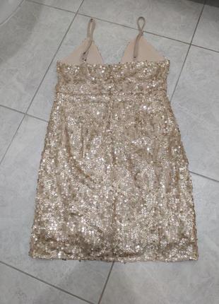 Платье мини с разрезом в пайетки р.87 фото