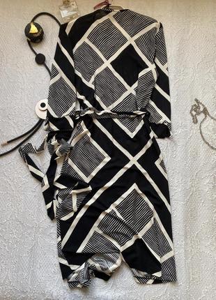 Вишукана та жіночна трикотажна сукня міді, розмір m-l5 фото
