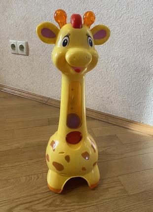 Іграшка каталка жираф2 фото