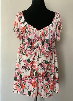 Жіноча еластична блуза в квіти