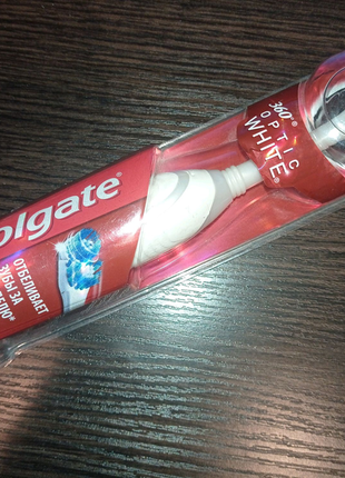 Електрична зубна щітка colgate 360 optic white6 фото