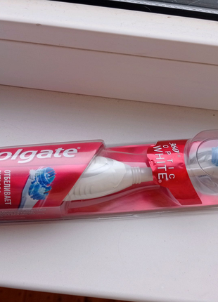 Електрична зубна щітка colgate 360 optic white4 фото