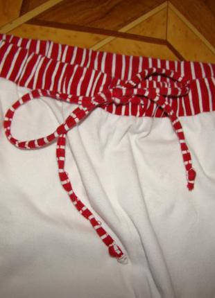 Укороченые трикотажные штаны в спортивном стиле (р.s)2 фото