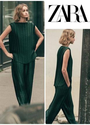 Изумрудный плиссированный костюм zara, хорошо тянется, но лучше брать привычный размер1 фото