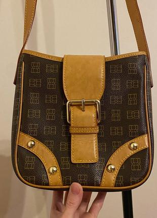 Женская кожаная коричневая брендовая сумка1 фото