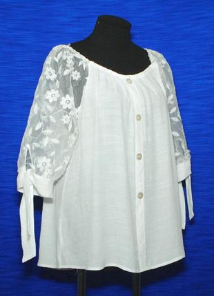 Очаровательная белая блуза с объемным рукавом из гипюр-капрона.3 фото