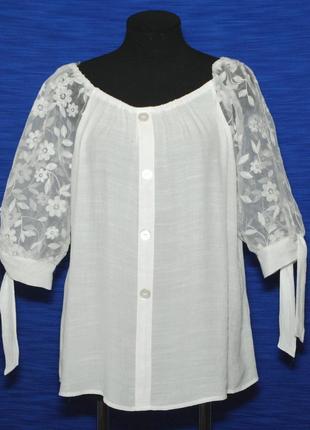 Очаровательная белая блуза с объемным рукавом из гипюр-капрона.8 фото