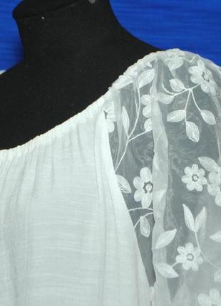 Очаровательная белая блуза с объемным рукавом из гипюр-капрона.9 фото