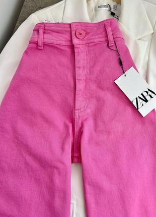 Розовые расклешонные джинсы2 фото