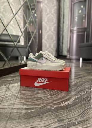 Кросівки найк форсы жіночі nike air force2 фото