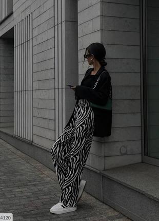 Брюки женские стильные легкие тонкие летние удобные широкие расклешенные палаццо с принтом зебра арт 0315 фото