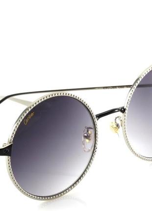 Жіночі круглі сонцезахисні окуляри cartier в срібних оправах.2 фото