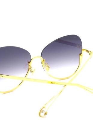 Стильні сонцезахисні окуляри gucci.2 фото