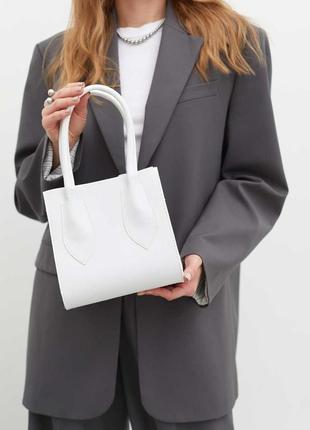 Модная  женская сумочка с брелком и двумя ручками и плечевым ремнем,маленькая  женская сумочка «лиана» розовая7 фото