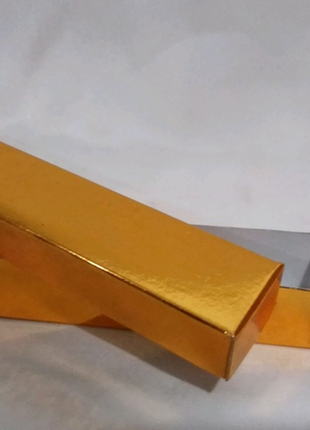 Коробка подарункова, картонна, золотого кольору розміром 17/3/3 д2 фото