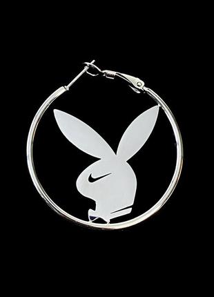 Кругла сережка playboy swoosh з медичної сталі