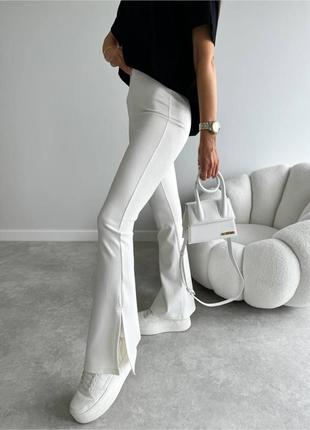 Женские брюки с разрезами и потайной змейкой8 фото