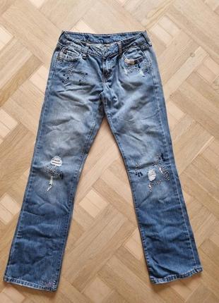 Продам женские джинсы р.46 с вышивкой1 фото
