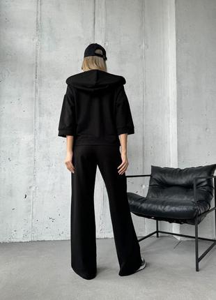 Женский качественный спортивный черный костюм, укороченная кофта на молнии и широкие брюки8 фото