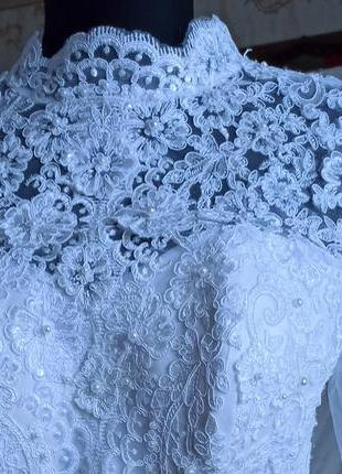 Красиве весільне плаття з довгим рукавчиком.4 фото