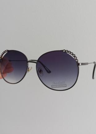 Нові стильні сонцезахисні окуляри раунди з стразами