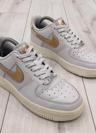 Жіночі кросівки nike wmns air force 1 07 mtlc (25,5 см)