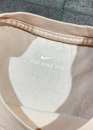 Нежно персиковая футболка nike tee3 фото