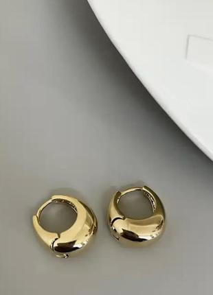 Стильні сережки краплі в золоті сріблі1 фото