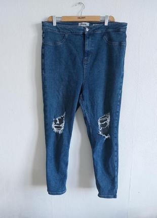 Трендовые джинсы скинни с разрезами на высокой посадке