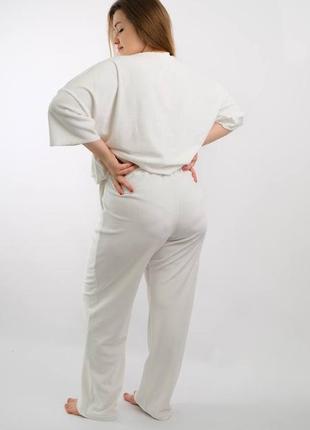 Велюровый костюм футболка с удлиненным рукавом и широкие брюки2 фото