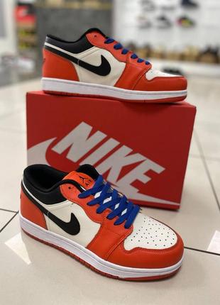 Чоловічі кросівки помаранчеві  з білим nike air jordan 1 low4 фото