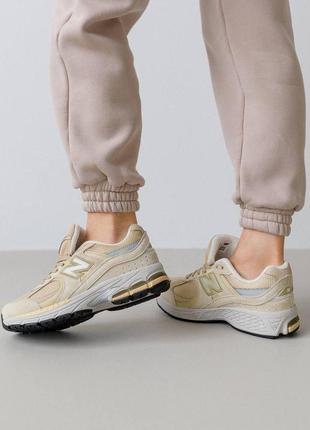 Жіночі кросівки new balance 2002r beige sand пісочні спортивні замшеві кроси подальше балансування9 фото