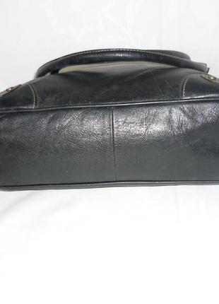 Качественная компактная вместительная кожаная сумка в винтажном стиле производство испания7 фото