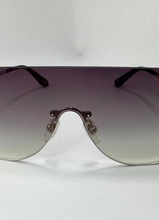 Солнцезащитные очки унисекс маска безободковые линзы градиент с тонкими металлическими дужками3 фото