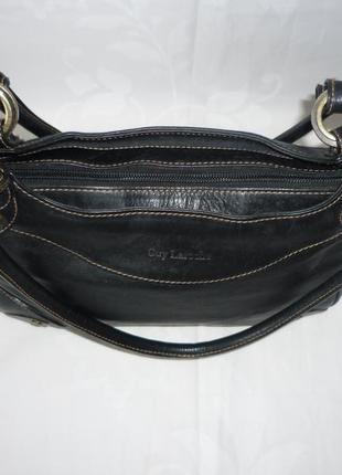 Качественная компактная вместительная кожаная сумка в винтажном стиле производство испания8 фото