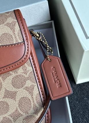 Сумка coach из качественной кожи с фирменной канвой. (арт: 99068)  📐 размер: 14 x 17 x 4 см 🧵 мате7 фото