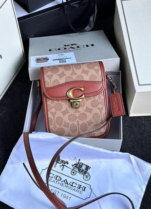 Сумка coach из качественной кожи с фирменной канвой. (арт: 99068)  📐 размер: 14 x 17 x 4 см 🧵 мате2 фото