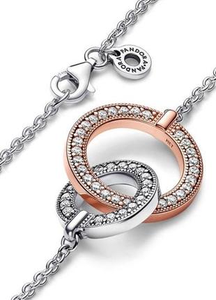 Серебряное двухцветное ожерелье колье с переплетенными кольцами3 фото